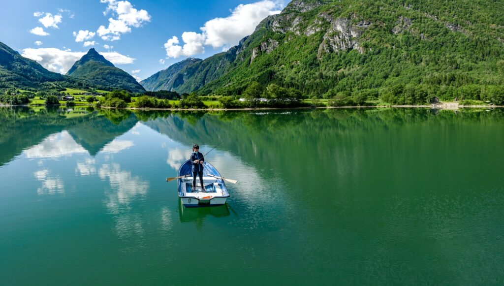 woman-fishing-on-a-boat-.jpg